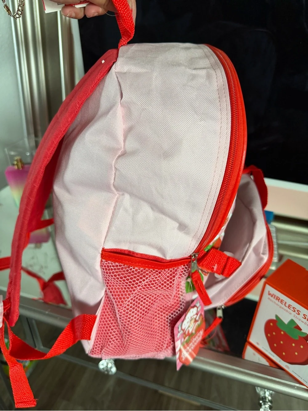 Pink Strawberry Kids Backpack with Lunchbox and a strawberry wireless speaker
